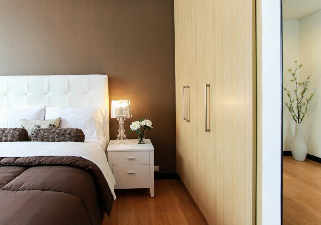 pexels photo 90319 90319 Elegant bedroom with modern furniture, soft lighting, and cozy ambiance.